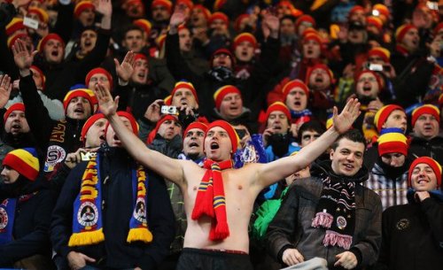 Football fans supporting their team.