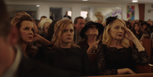 Sharp Objects characters at a funeral.