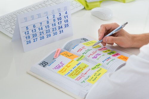 Man planning his weekly schedule.