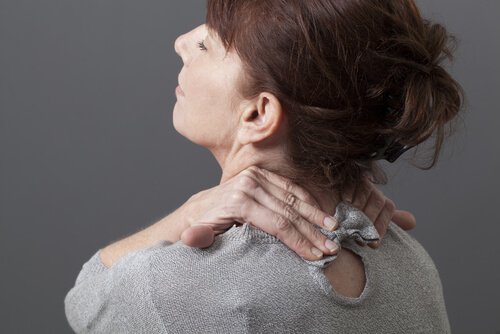A woman with neck pain.