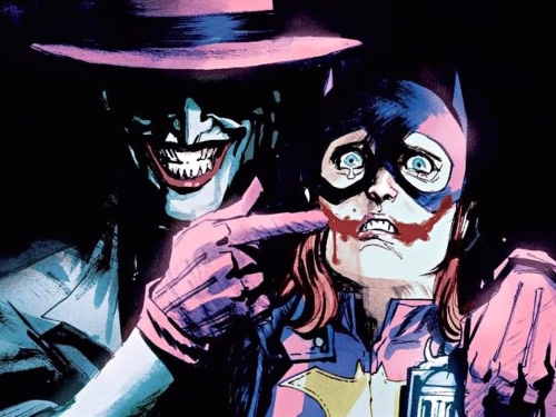 The Joker threatening Catwoman.