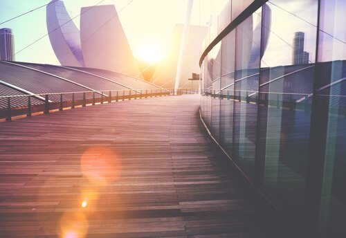 A building with sunlight in the background.