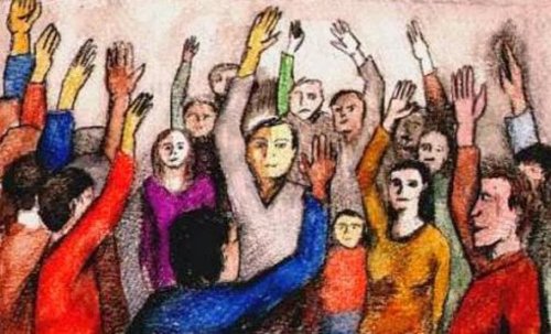 Group of people identifying with one another by raising their hand.
