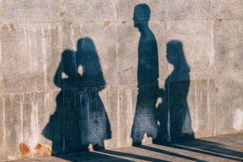 The shadows of a social group walking.