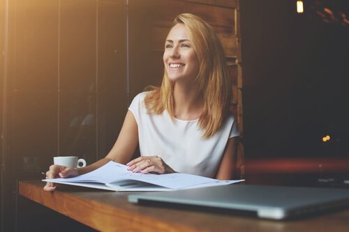 A happy woman at work.
