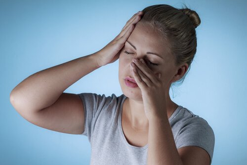 A woman with a sinus headache.
