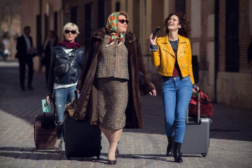 Paquita Salas walking with her friends.