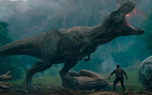 A T. rex and a man.