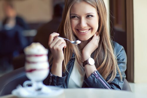 A woman eating ice cream.