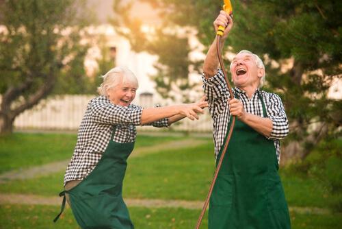 An elderly couple enjoying the benefits of humor.