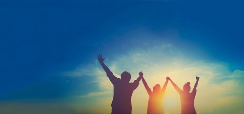 Enthusiastic people at sunrise.