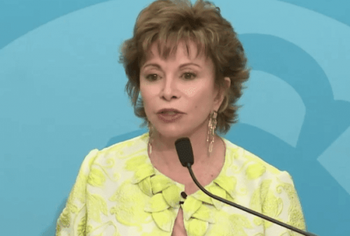 Isabel Allende answering questions during a conference.