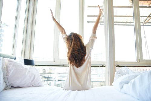A woman waking up.