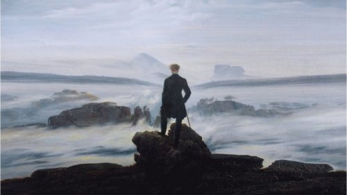 A painting by Kaspar Friedrich of a man looking at the sea.