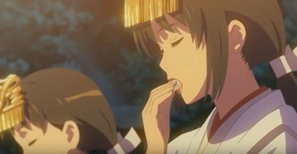 A drawing of two girls, one eating.