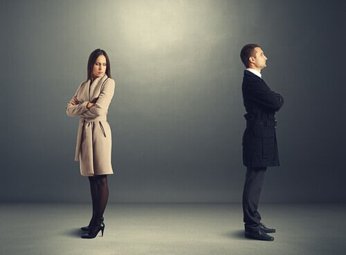 two people with their backs to each other representing hate
