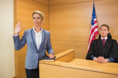 witness being sworn under oath