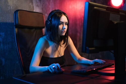 A woman playing Fortnite. 
