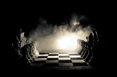 A chess board in the dark.