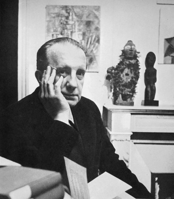 Paul Eluard looking into the camera.
