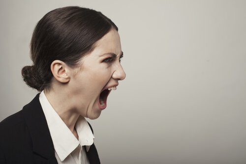 woman yelling and showing aggressive behavior