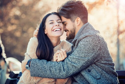 A couple hugging.