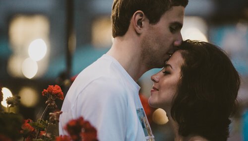 A couple embracing.