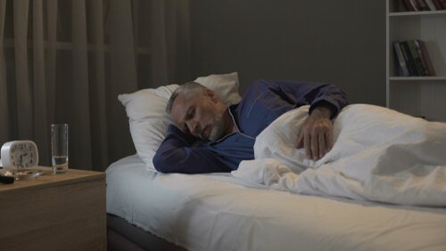 An old man sleeping.