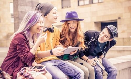 a group of teenagers hanging out together