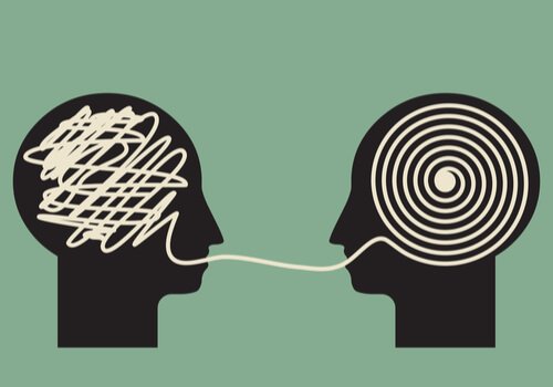 Two head profiles with mind drawings representing Carl Hovland theories.