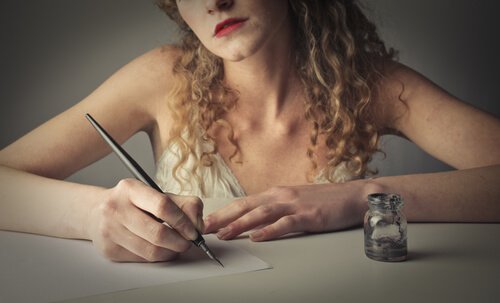 a woman writing by hand