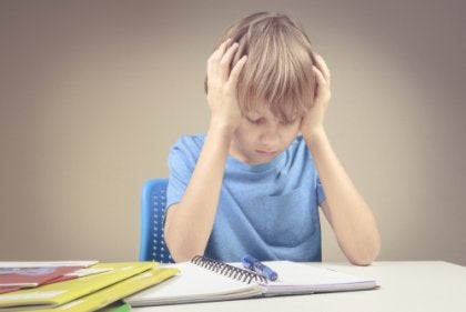 A frustrated kid doing homework.