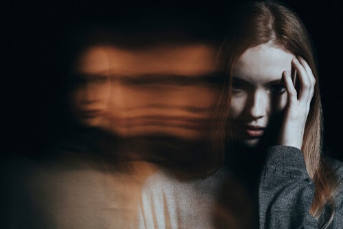 A woman experiencing hallucinations where she feels like she's becoming detached from herself.