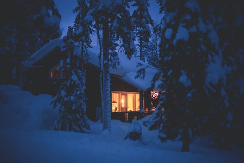 A cabin covered in snow, just as the one in the story about differences.