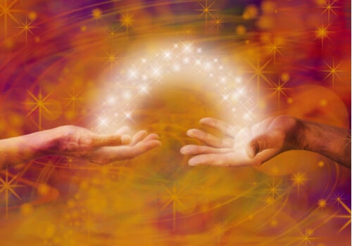 Energy going from one hand to another.