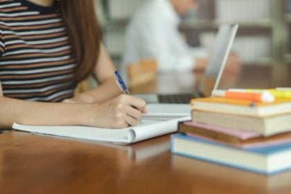 A girl studying.