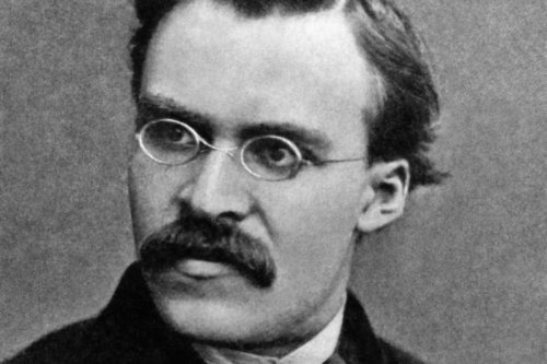 A black and white photo of Nietzsche.