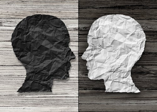 Two heads facing each other.