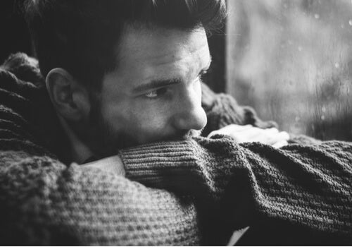 A man looking out and thinking.