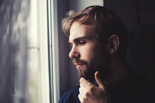 A logical and consistent man sitting down and thinking.
