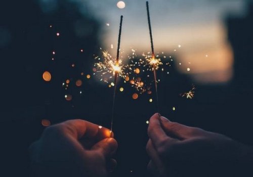 A person playing with fireworks.