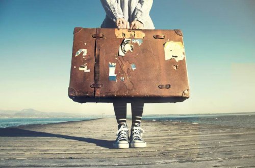 A person with their luggage.