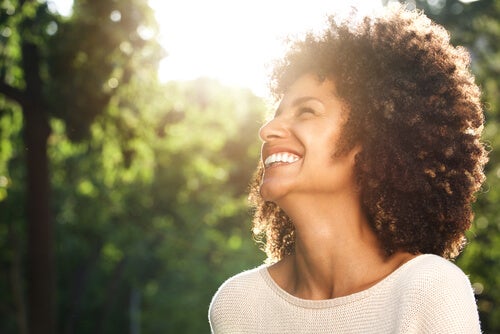 A woman laughing.