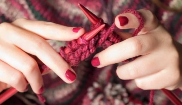 A person knitting something.
