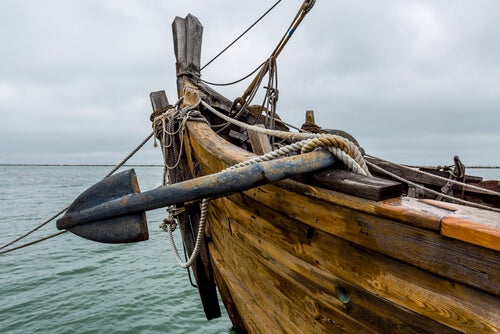 An image of an old ship sailing at sea