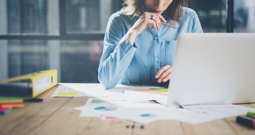 A woman working at an office.