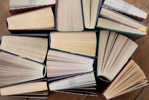 A bunch of books piled up.