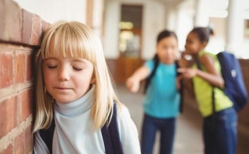 A girl at school being bullied.