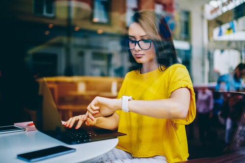 A woman working in a cafe.