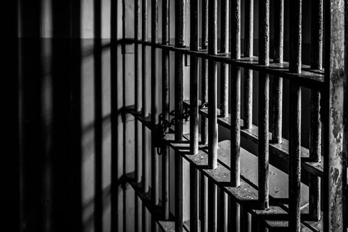 The doors of a prison cell.